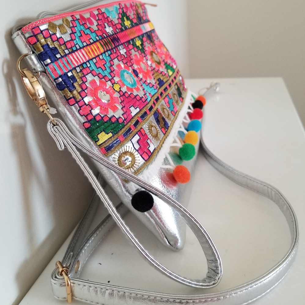 Silver wristlet with embroidered detail, EUC